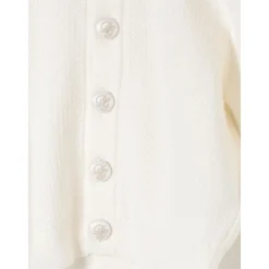 e Strickjacke mit Perlenknöpfen><noscript><img width=